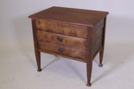 An Edwardian stained beech sheet music box/cabinet, with lift up top and two drawers, raised on