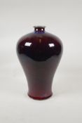 A Chinese flambe glazed porcelain Meiping vase, 13" high
