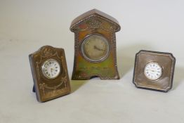 An Edwardian oak cased desk clock with silver mount, 5½" high, Birmingham 1908, a small silver