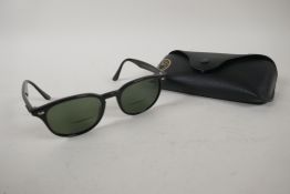 A pair of Ray-Ban bi-focal sun glasses, RB4259, in original case