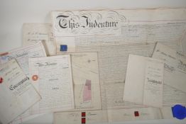 A collection of C19th and C20th legal indentures and a quantity of period black and white