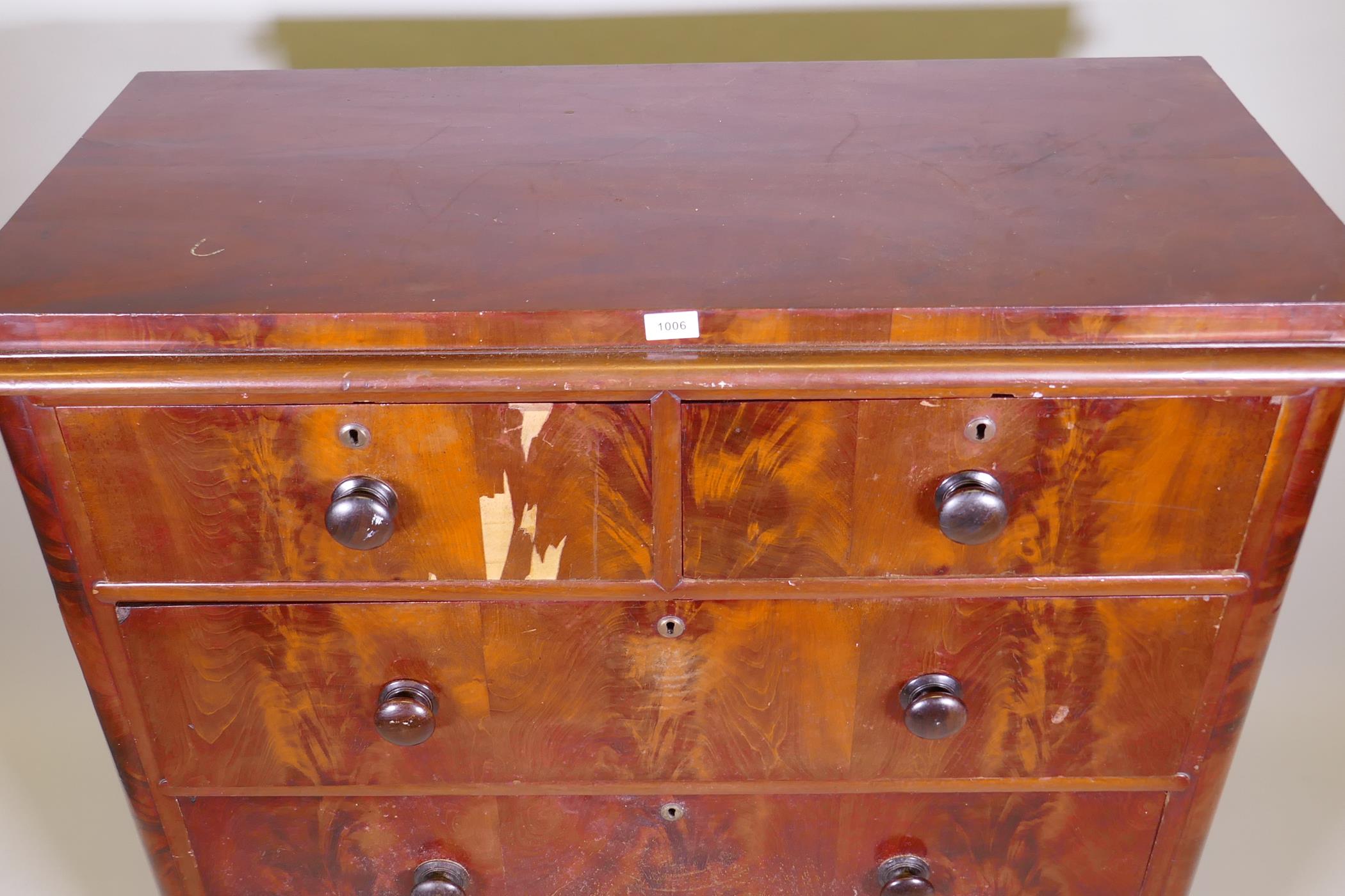 A Victorian figured mahogany chest of two over three drawers with rounded corners, raised on bun - Image 2 of 5