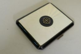 An Art Deco hallmarked silver card case with engine turned and enamel decoration, set with