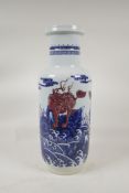 A Chinese blue and white porcelain rouleau vase, decorated with mythical creatures in iron red, 17½"