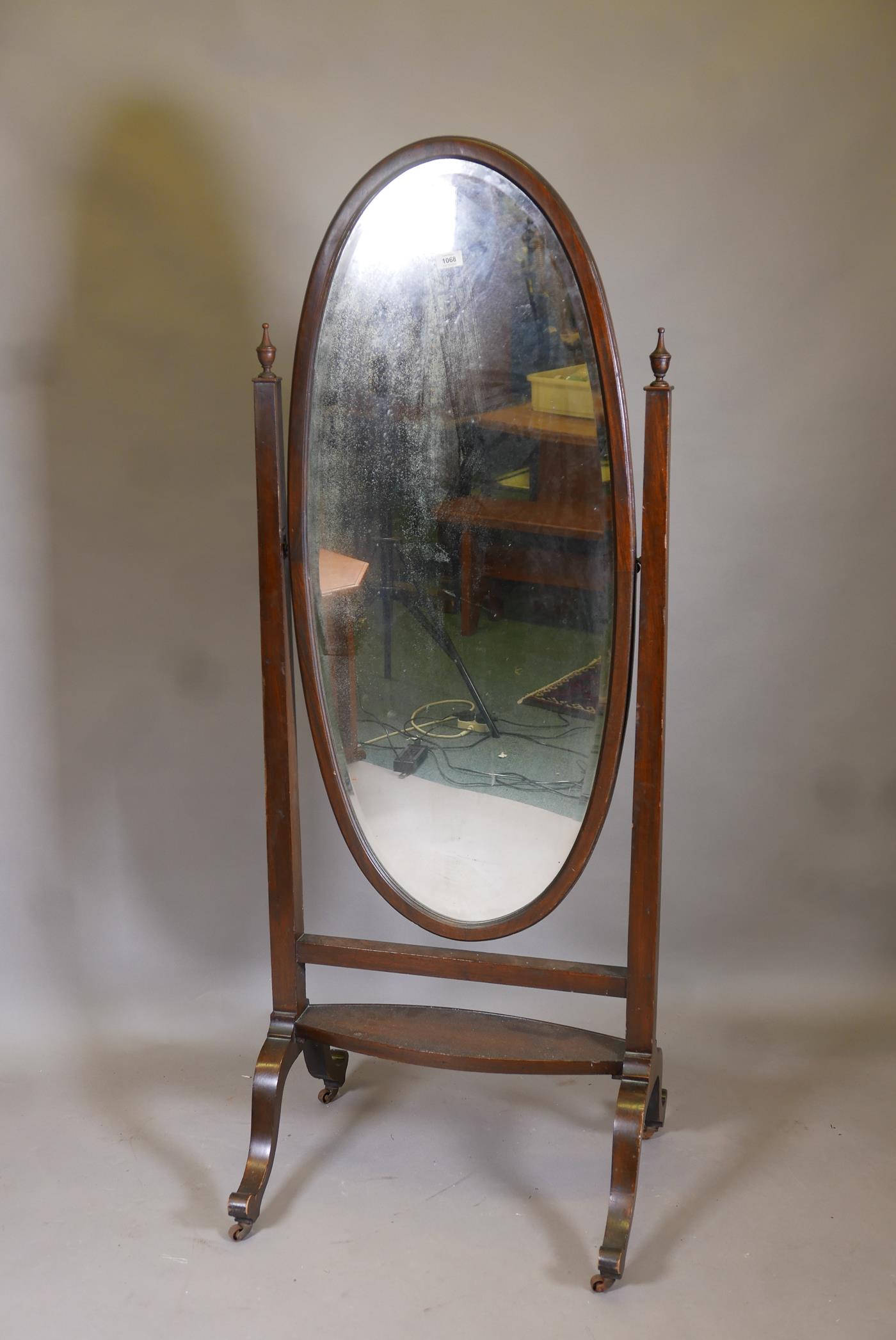 A Victorian mahogany cheval mirror with original bevelled glass, raised on cabriole supports with - Image 2 of 2