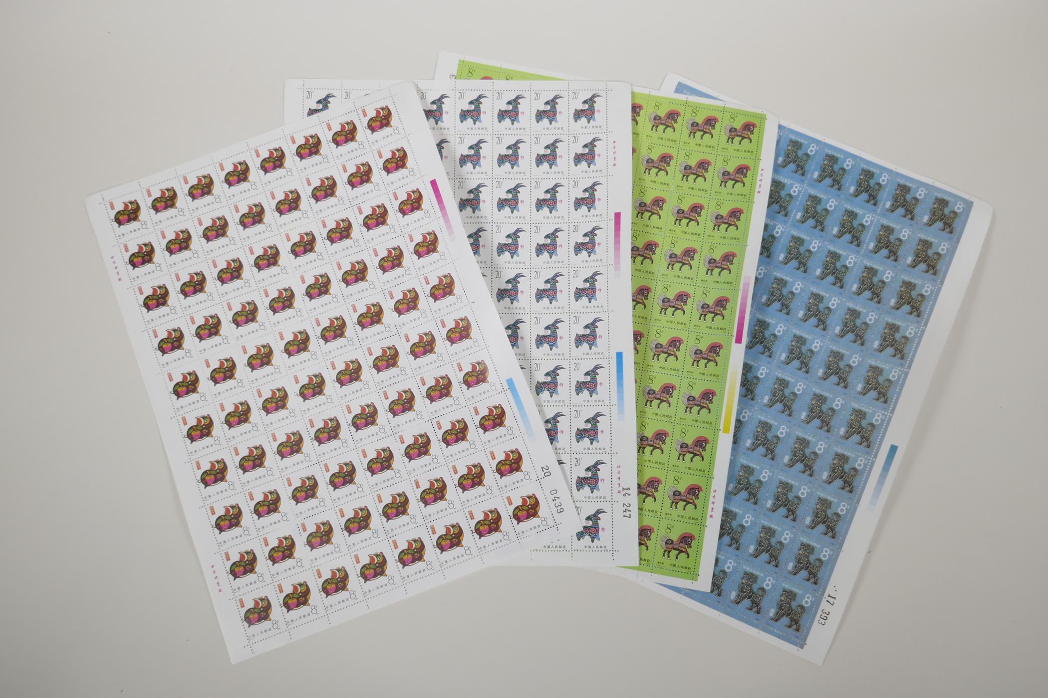 Four sheets of facsimile (replica) Chinese zodiac stamps