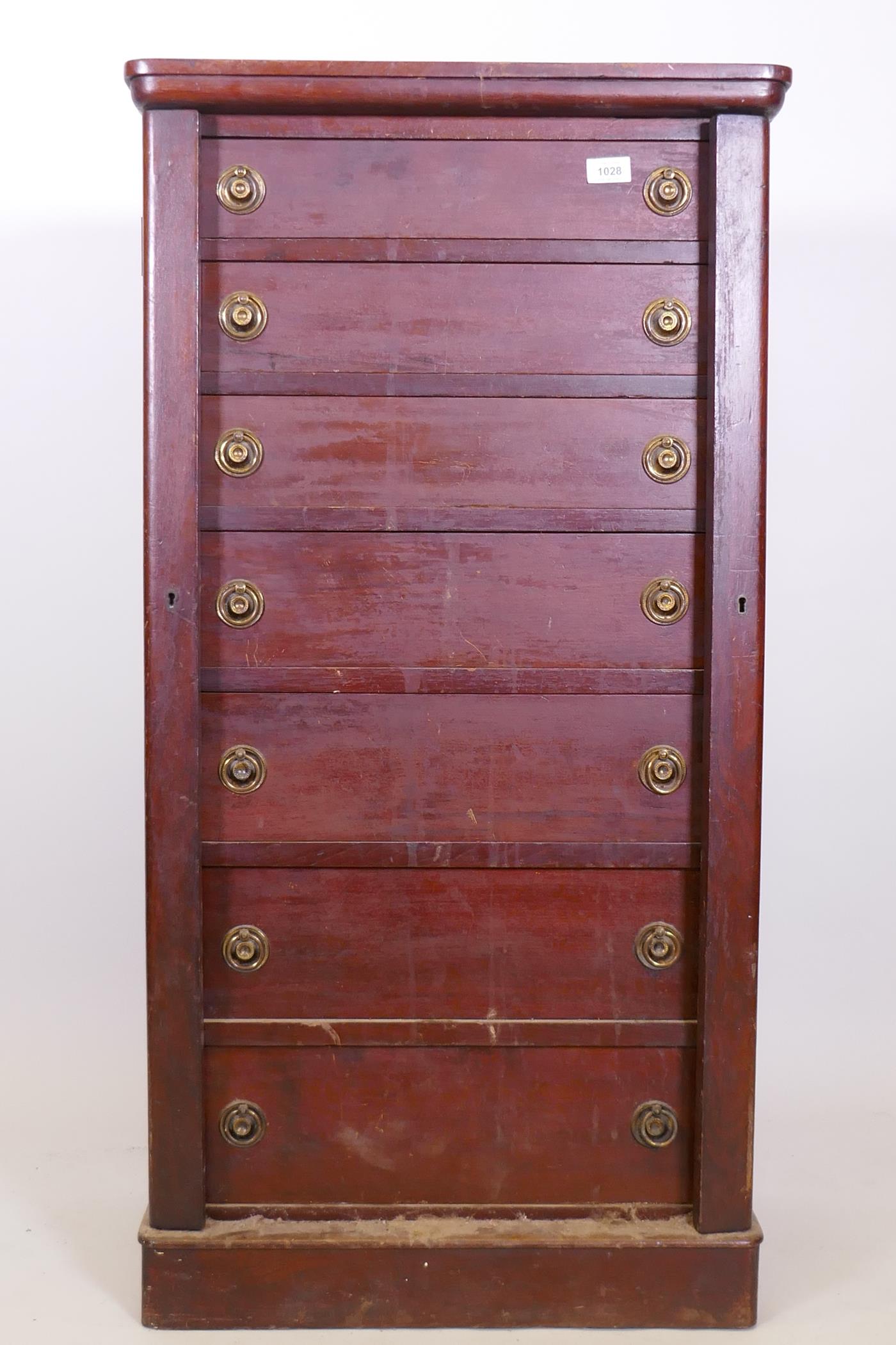 A C19th mahogany seven drawer Wellington chest, with brass ring handles, raised on a plinth base, - Image 2 of 3