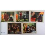 A selection of horror film lobby cards and poster