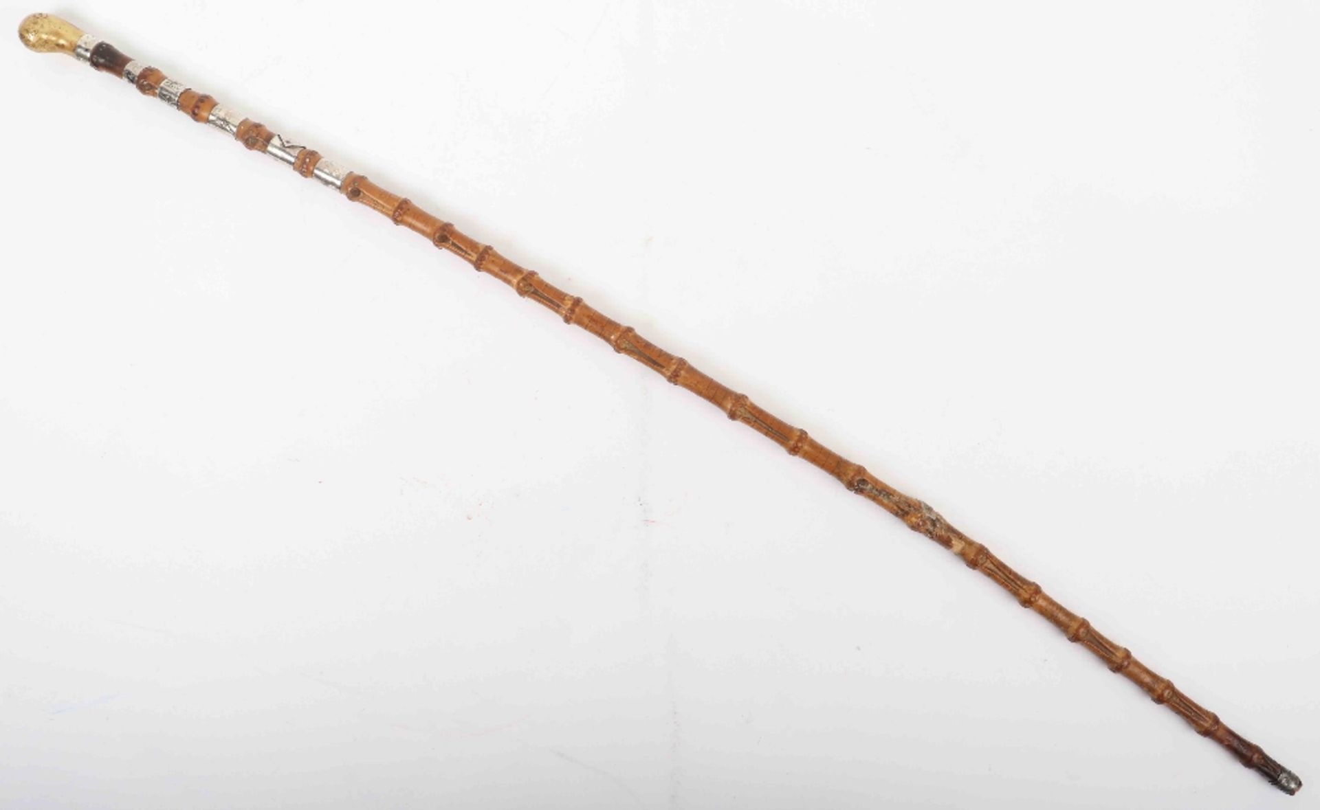 A 19th century Horse Racing memento silver banded bamboo walking cane