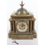 A French 19th century green onyx mantle clock