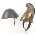 French brass fire helmet and East german military steel helmet