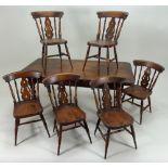 A dolls wooden dining table with six Windsor chairs, English circa 1905,