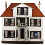 A large and impressive Lines Bros Triang painted wooden dolls house, English 1920s,