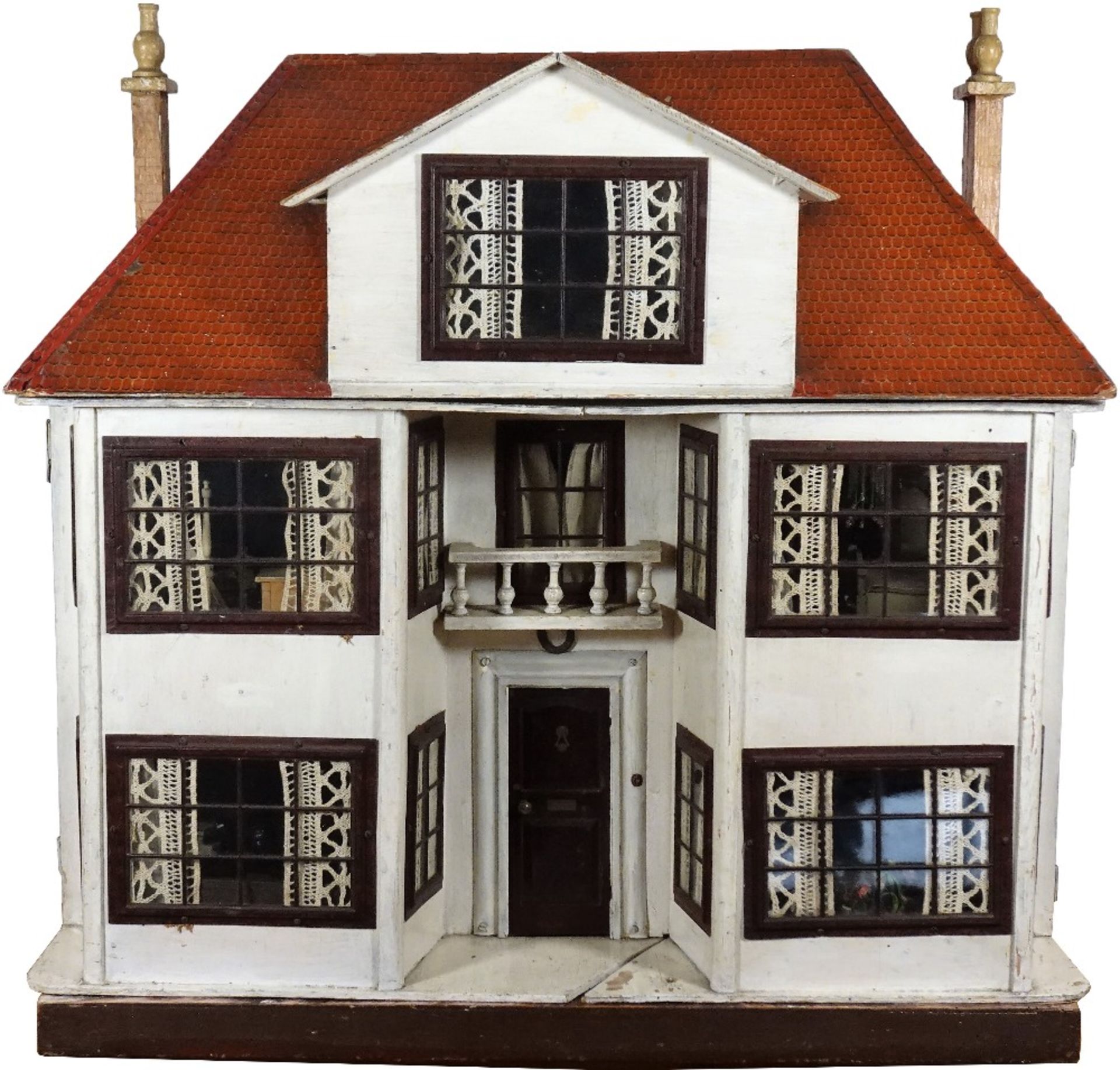 A large and impressive Lines Bros Triang painted wooden dolls house, English 1920s,