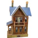 A Moritz Gottschalk model 3581 blue roof dolls house, German circa 1910,