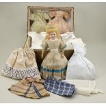 A fine bisque head B.S fashion doll with trunk and clothing, French circa 1870,