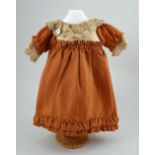 A brown cotton dolls dress for French Bebe, circa 1890,