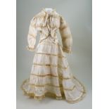 A cream silk dress for large French fashion doll, 1890s,