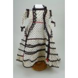 A good 1860s style cream and black polka dot French fashion dolls dress and jacket,
