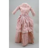 An early red and cream striped cotton dolls dress, circa 1860,