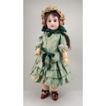 A Jumeau 1907 bisque head Bebe, size 12, French, circa 1900,