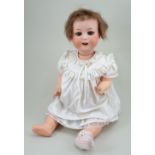 A Heubach Koppelsdorf 300 bisque head baby doll, German circa 1915,