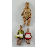 A family of three miniature Hertwig all-bisque rabbits, German circa 1910,