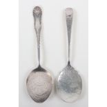 Two bowl decorated silver spoons