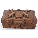 A 19th century Scottish carved wood box with Campbell clan crest and motto to lid