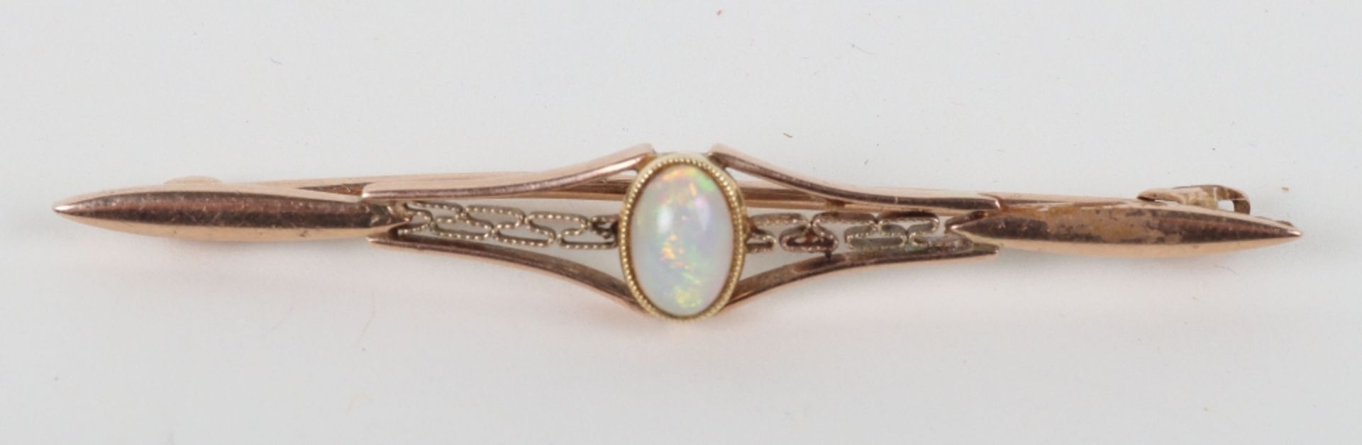 An Edwardian 9ct gold and opal set brooch
