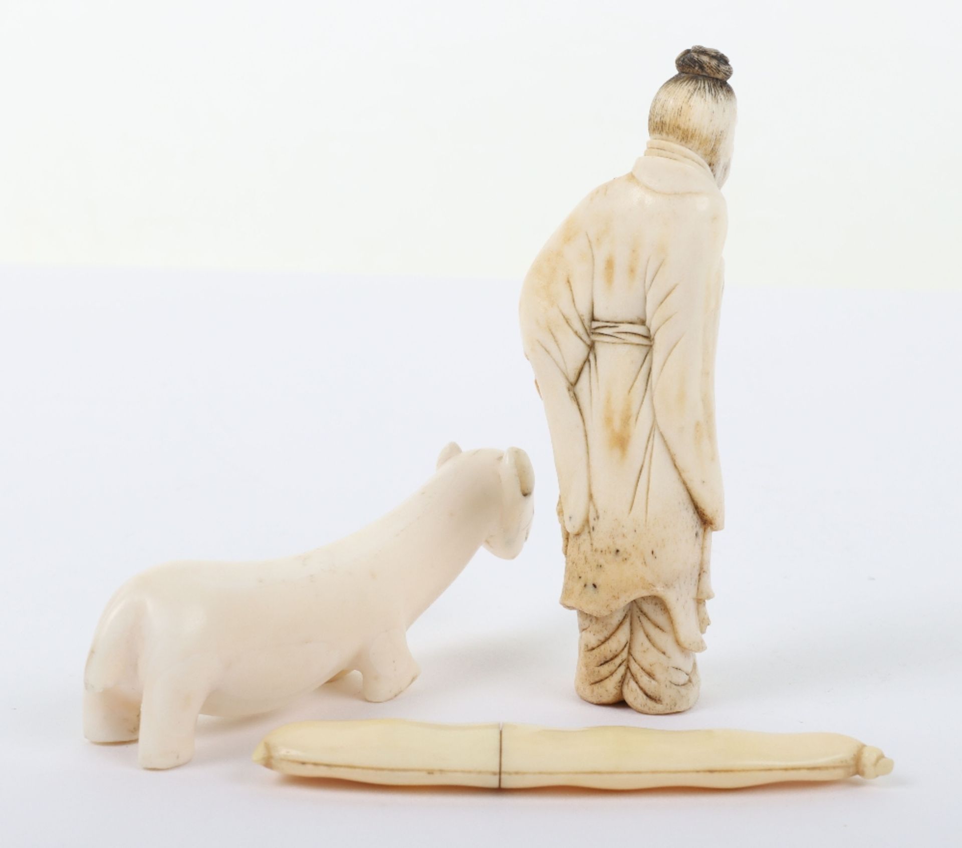 >A 19th century Japanese ivory bean, a Okimono of an elder and an Inuit carved bone polar bear - Image 2 of 2