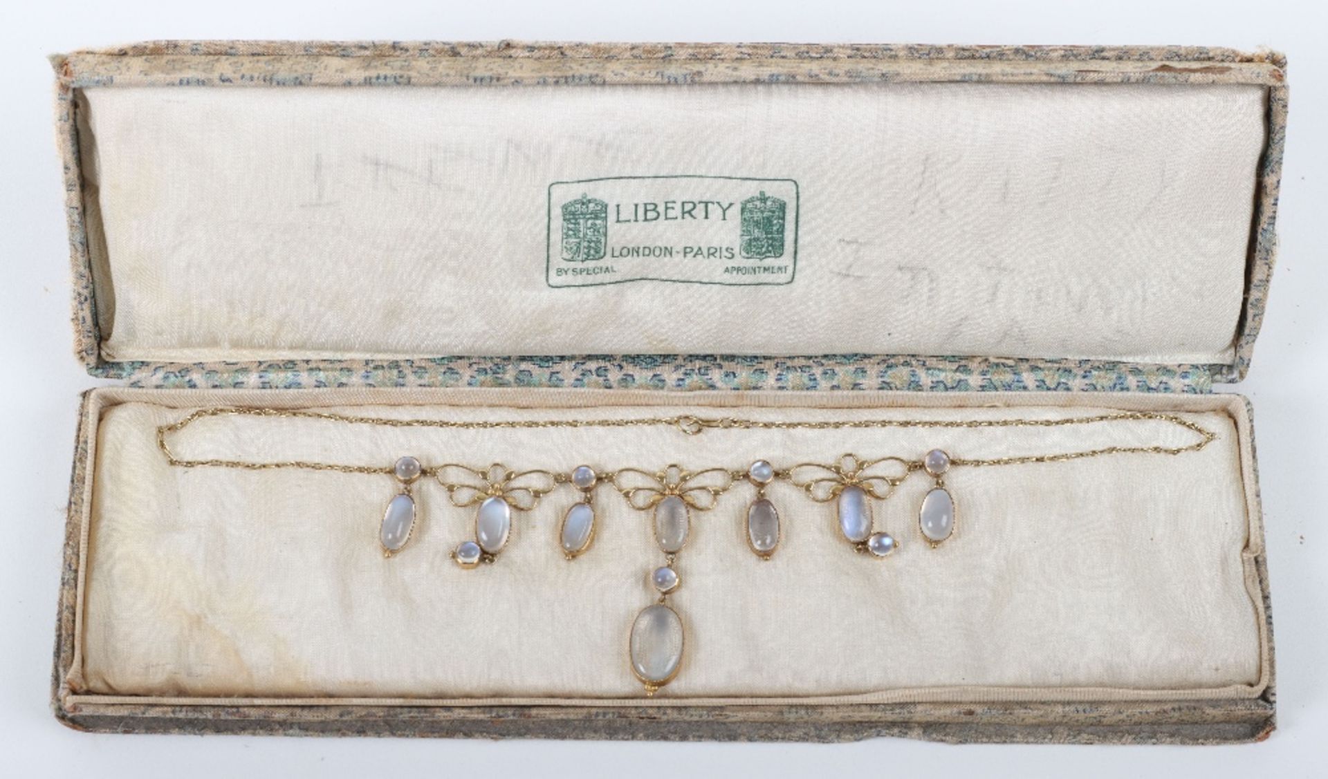 An Art Nouveau gold and moonstone necklace, in the style of Liberty & Co