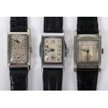 Three vintage tank style watches