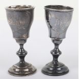 A pair of Russian silver vodka glasses, Moscow 84 Zolotnik