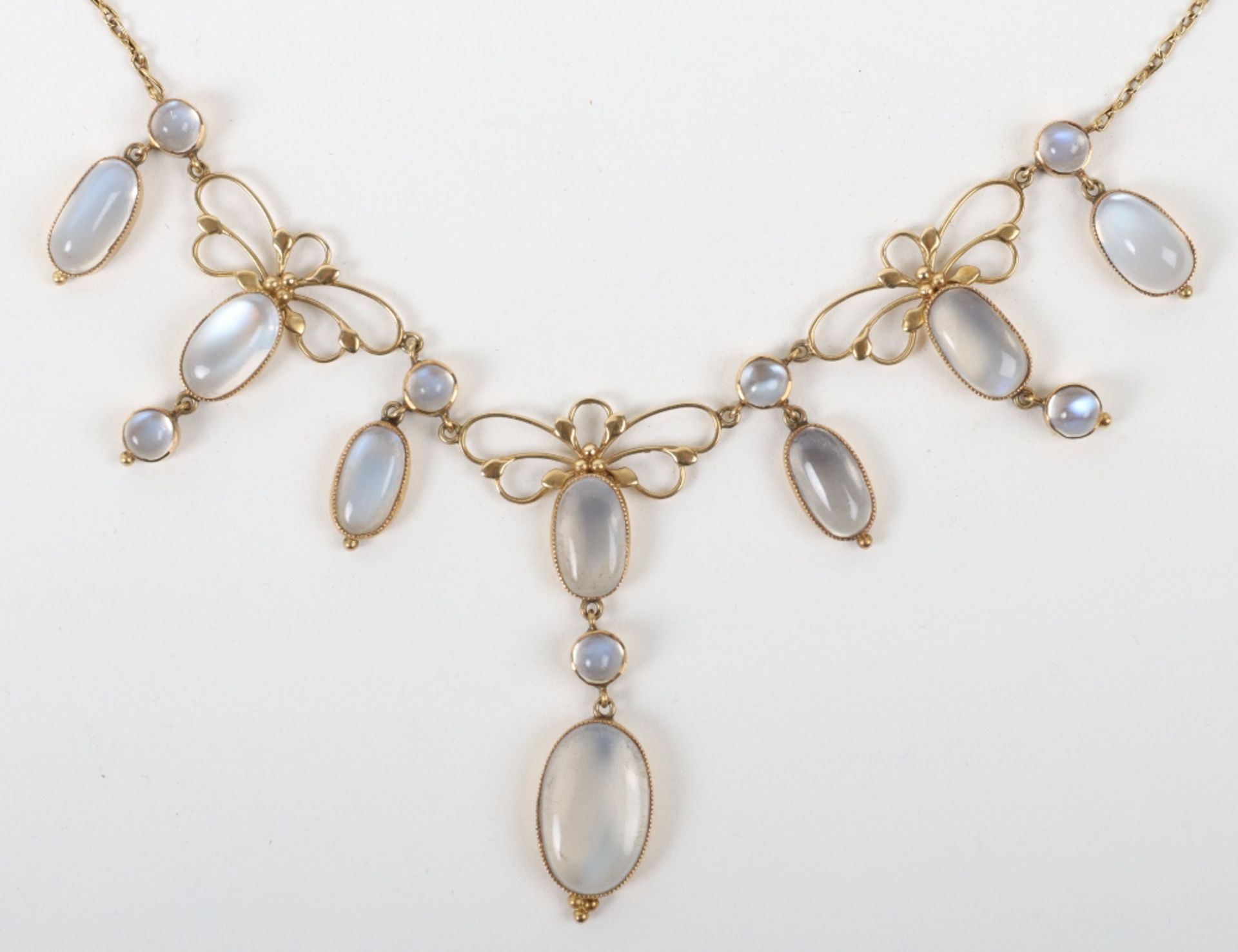 An Art Nouveau gold and moonstone necklace, in the style of Liberty & Co - Image 3 of 4