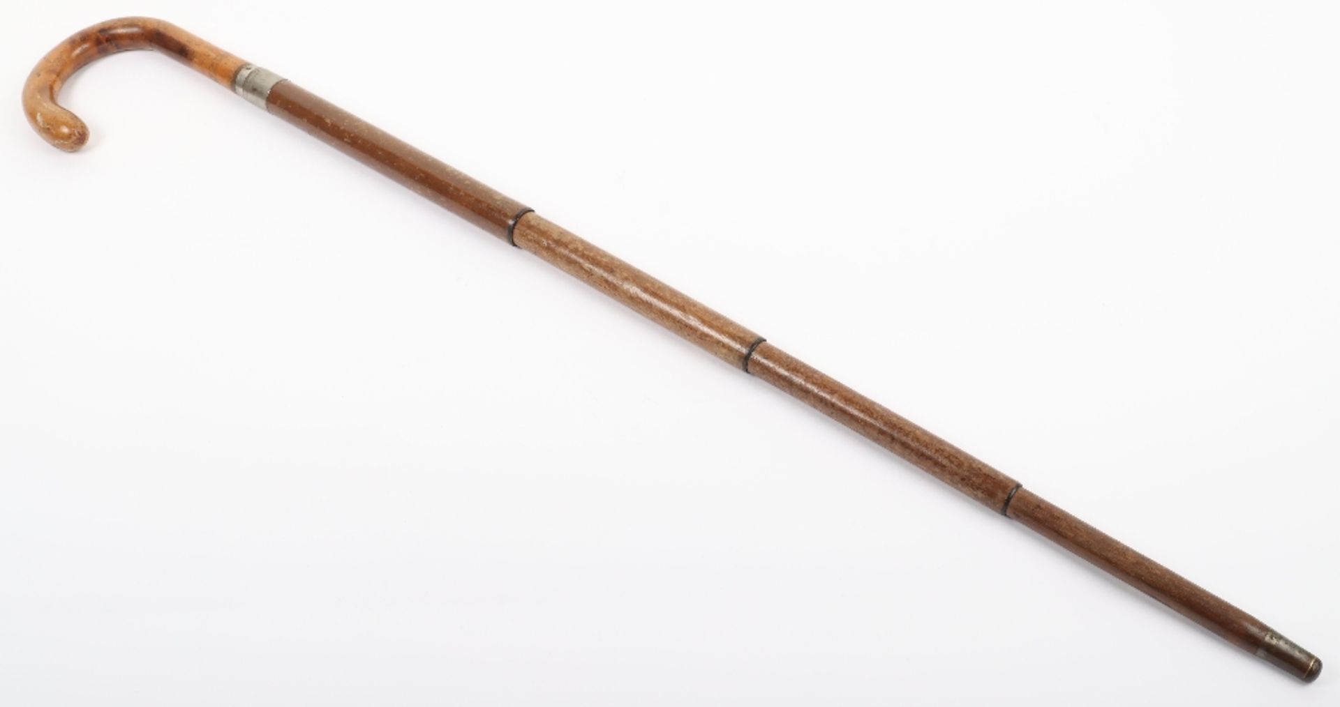 An early 20th century gentlemans walking stick / umbrella