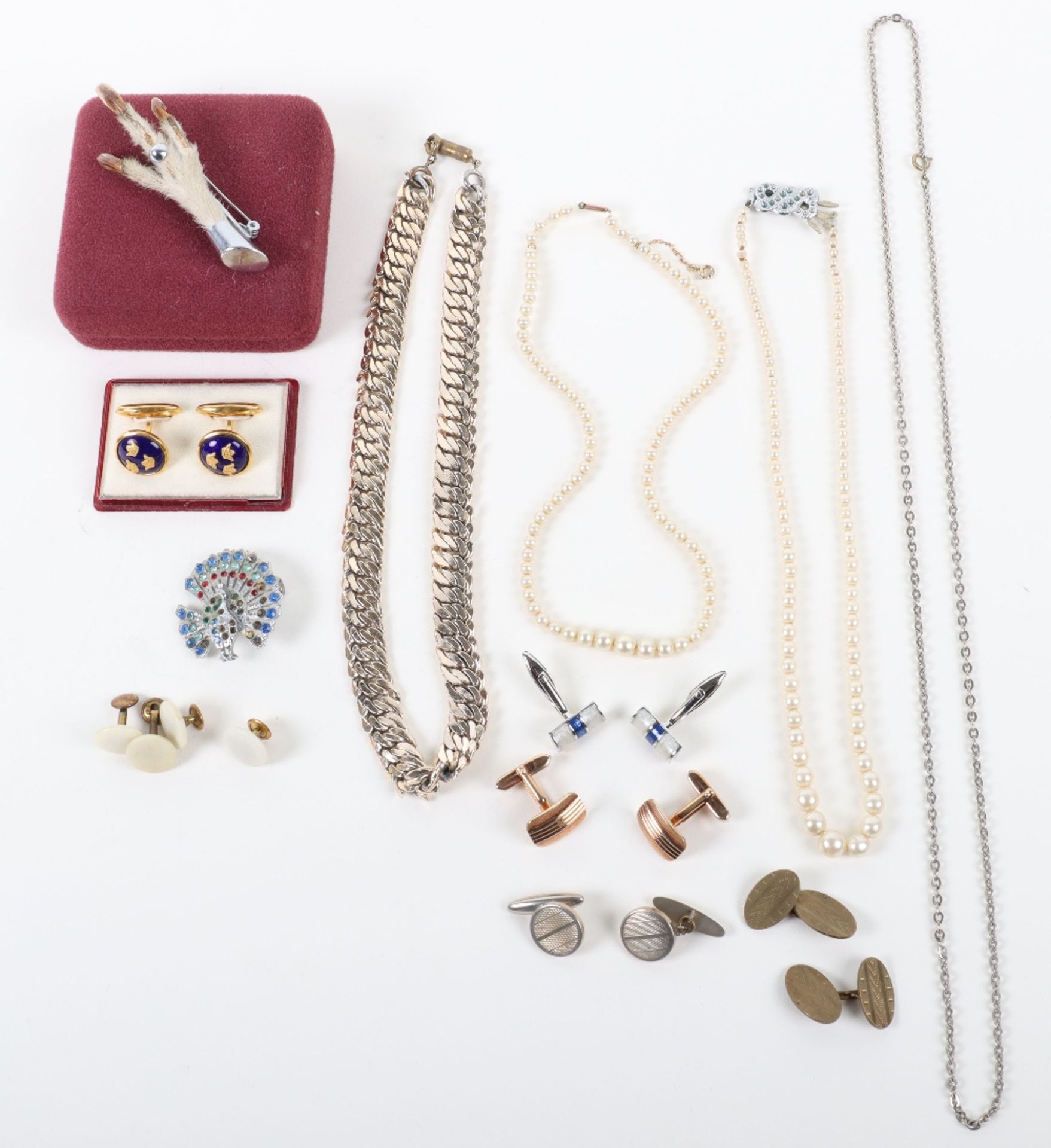 A selection of costume jewellery including a pearl necklace with 9ct clasp