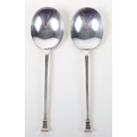 A pair of 17th century style serving spoons by, Josiah Williams & Co, London 1908