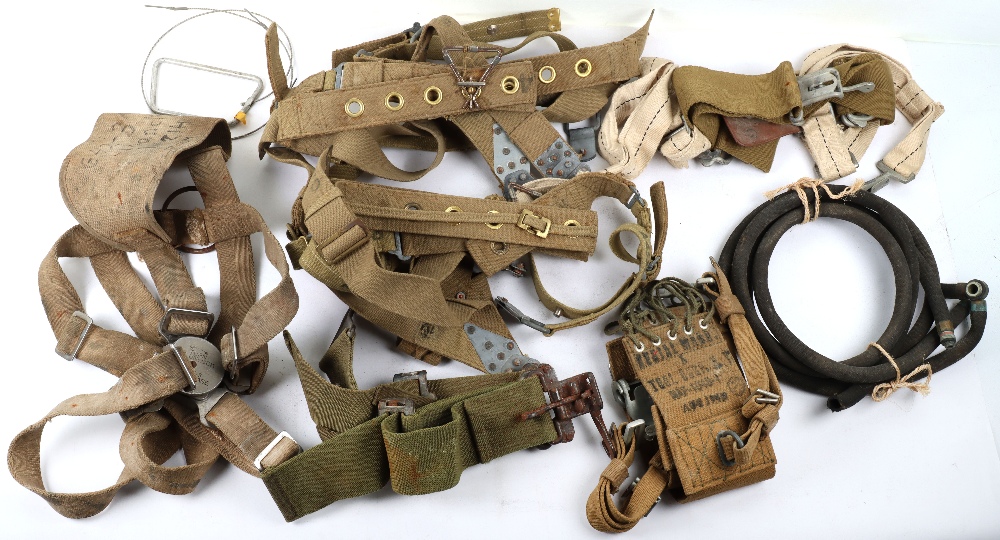 Assortment of WW2 US & British parachute harnesses and straps