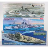 Three 1:350 scale model Battleship kits