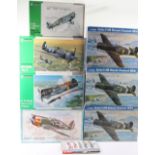 Seven 1:32 scale model Aircraft kits,