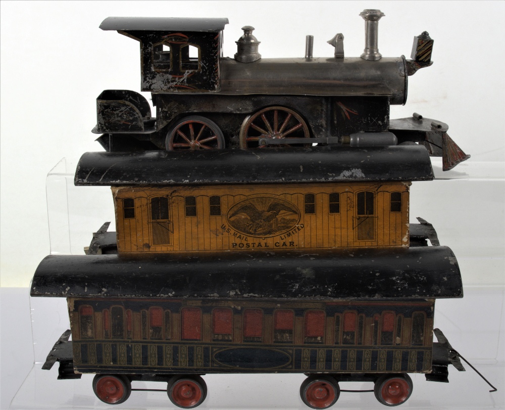 A rare and early gauge I Beggs 4-4-0 live steam locomotive with original Passenger and U.S Postal ca