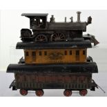 A rare and early gauge I Beggs 4-4-0 live steam locomotive with original Passenger and U.S Postal ca