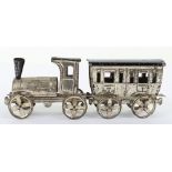 Early Meier pressed tinplate locomotive and carriage penny toy, German circa 1900