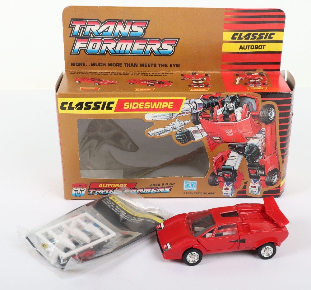 Four Hasbro Transformers G1 boxed action figures - Image 5 of 8