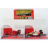 Two Boxed SCX F1 Model Slot Cars