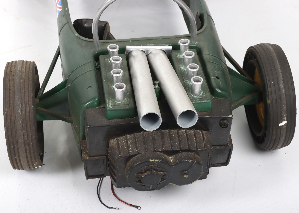 A Tri-ang moulded plastic Lotus child’s battery operated Racing car, English circa 1970 - Image 9 of 9