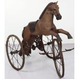 A rare child’s hand propelled chain driven mechanical sit on tricycle horse, French 19th century