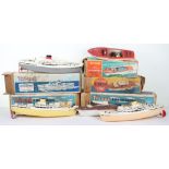 Five boxed Tri-ang plastic bodied model boats, 1960s