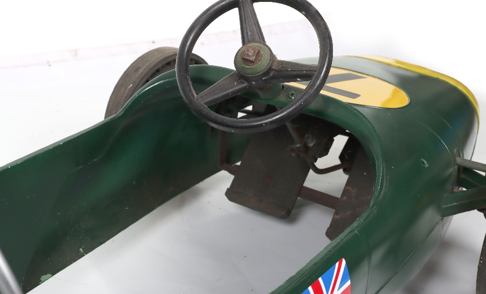 A Tri-ang moulded plastic Lotus child’s battery operated Racing car, English circa 1970 - Image 7 of 9